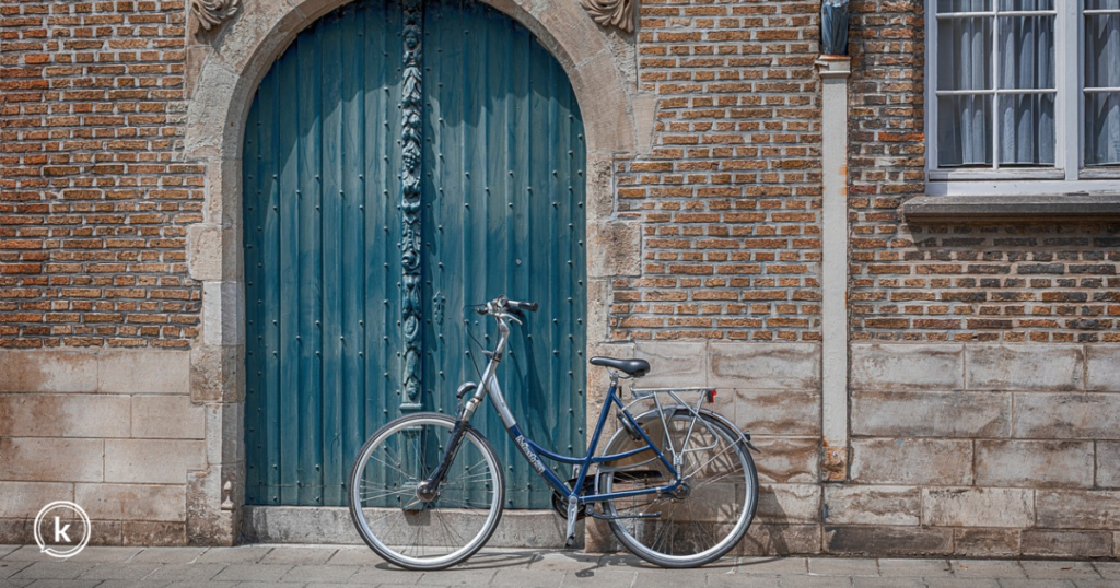 Door with bicycle in front of it